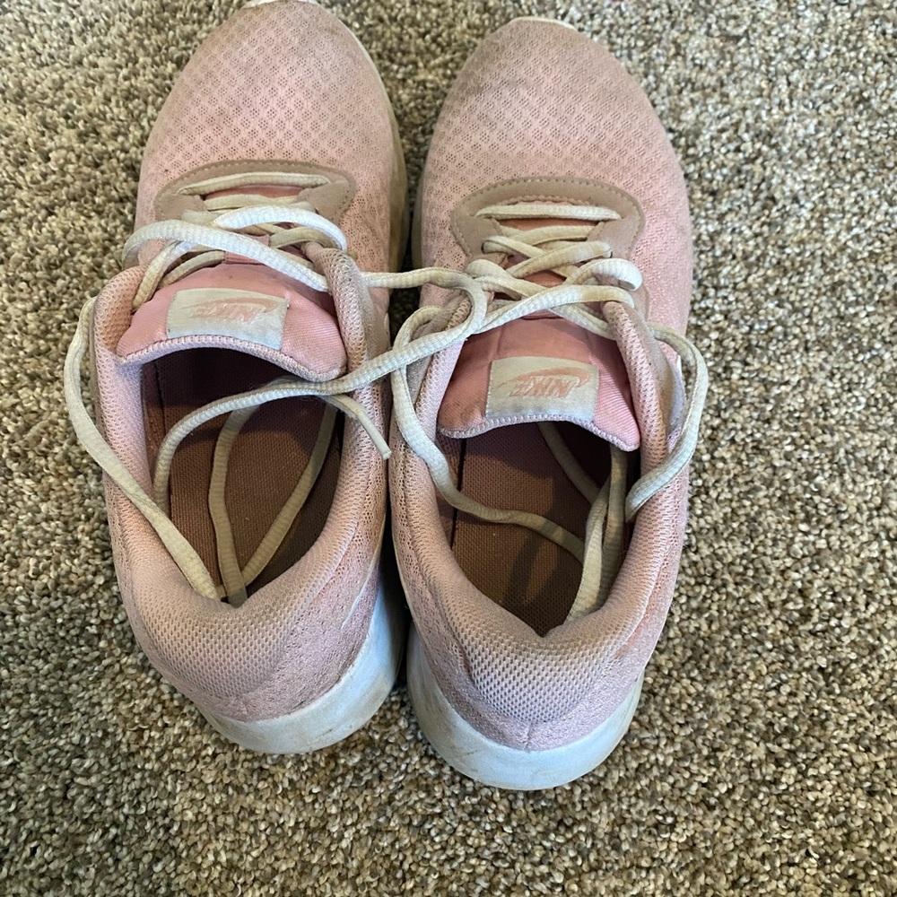 Light pink Nike tennis shoes
